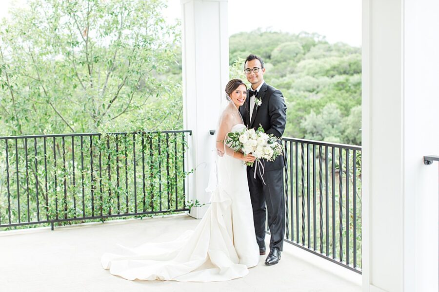 The bridge and groom on the Kendall Point balcony.