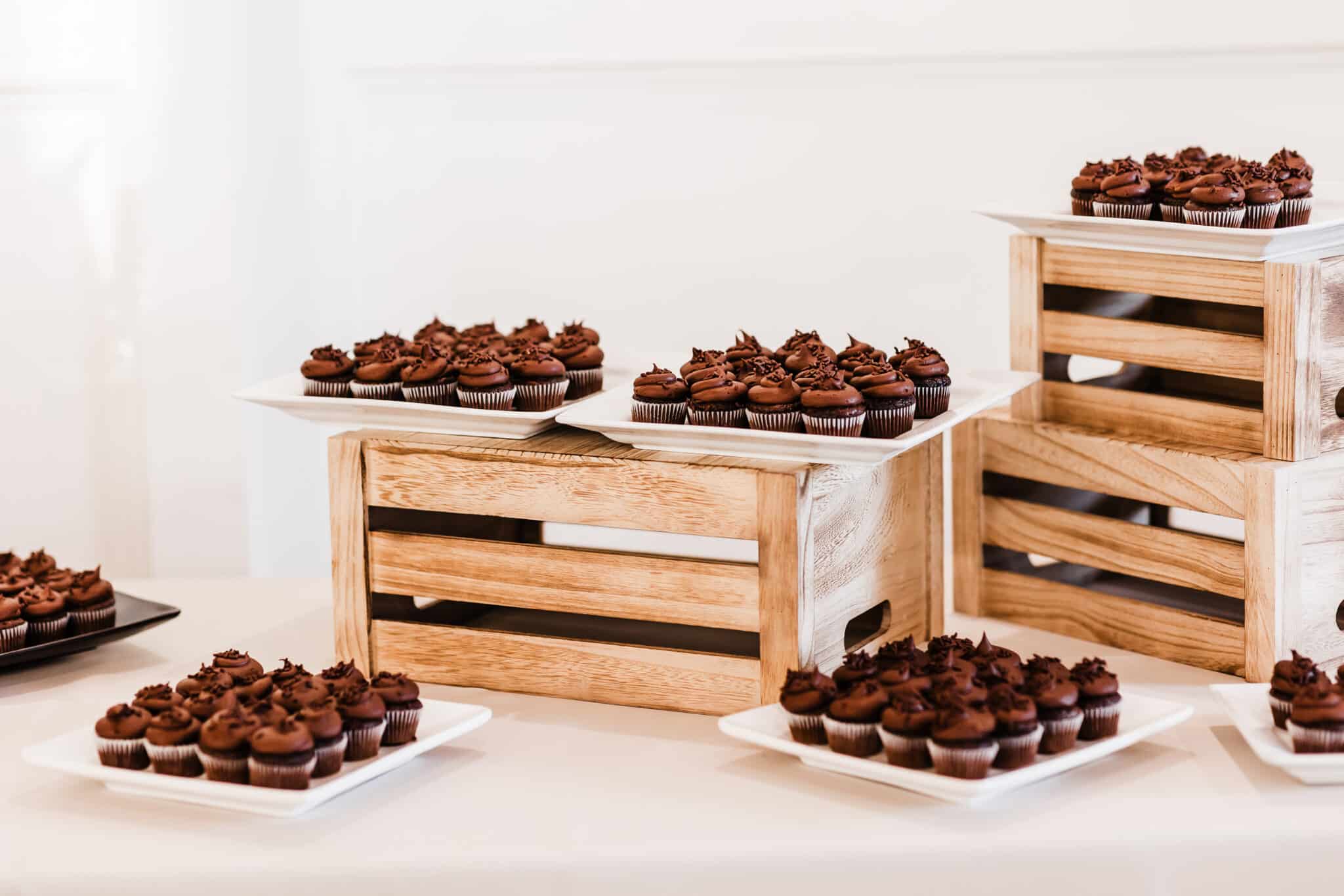 wedding dessert table at Kendall Point with mini chocolate cupcakes