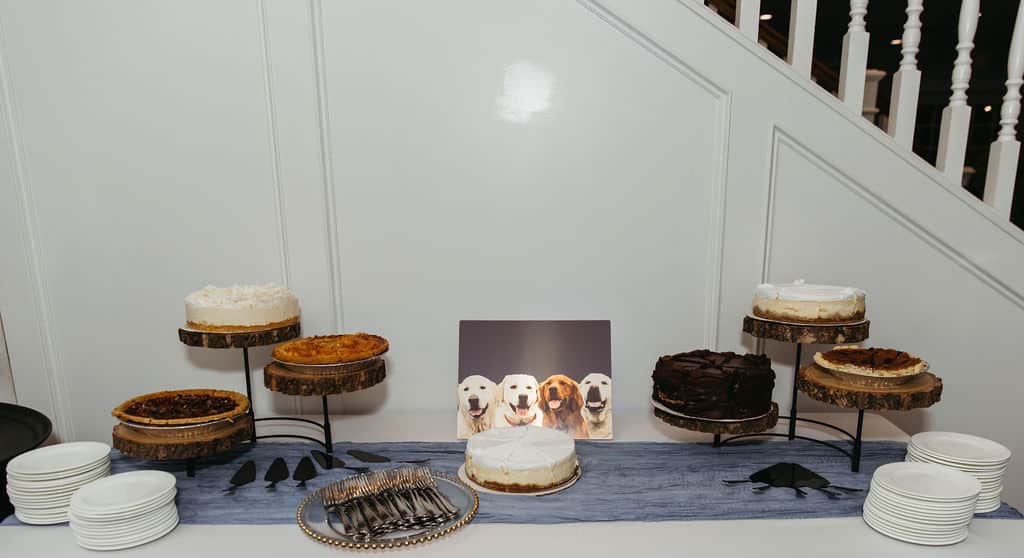 wedding dessert table at Kendall Point with various types of pie