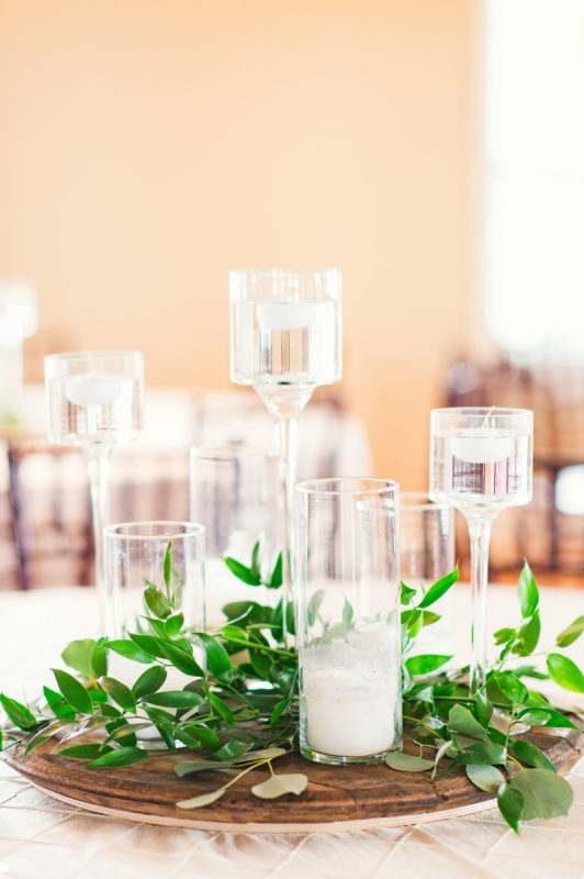 Simple class and candle centerpieces. 