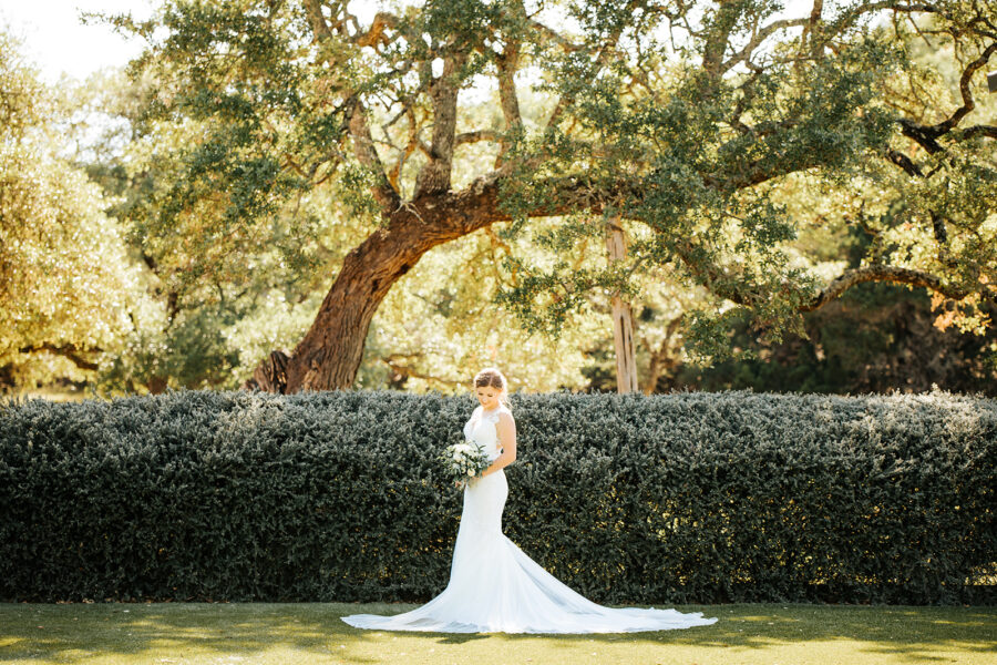 Kendall Point bride posting on the grounds.