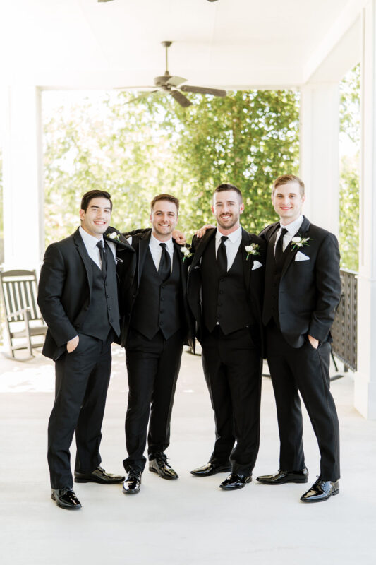 Groom and his groomsmen on Kendall Point veranda