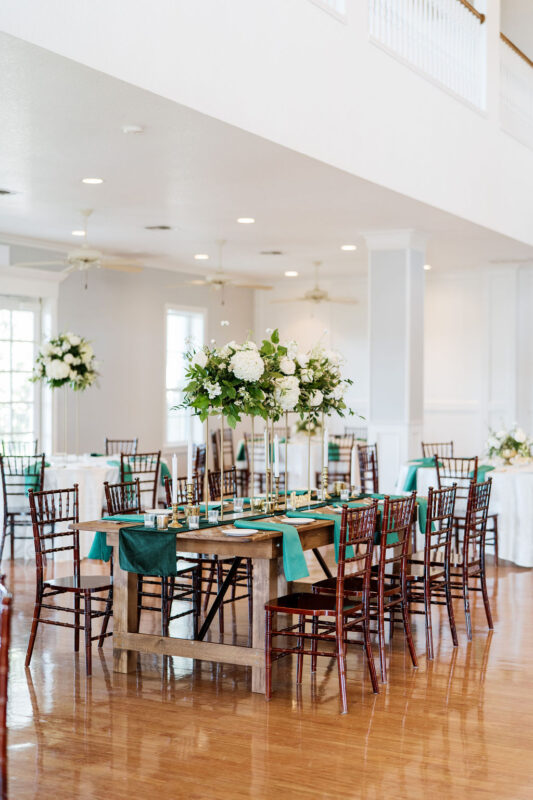 Farmhouse tables with green runners