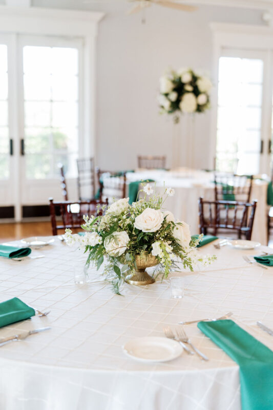 Centerpiece with white flowers and green accents