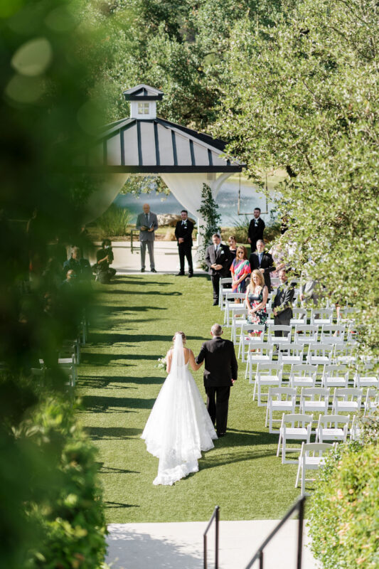 Aerial photo of bride walking down the aisle.