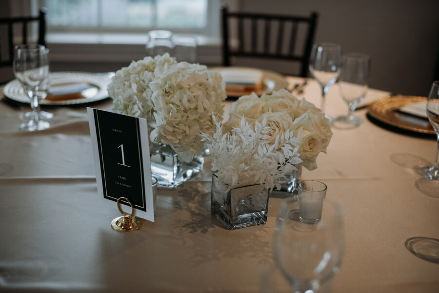 Elegant, small white floral centerpieces. 