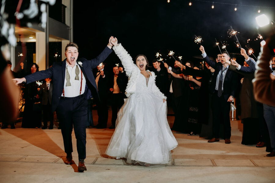 Bride and groom scream with excitement during their grand exit.