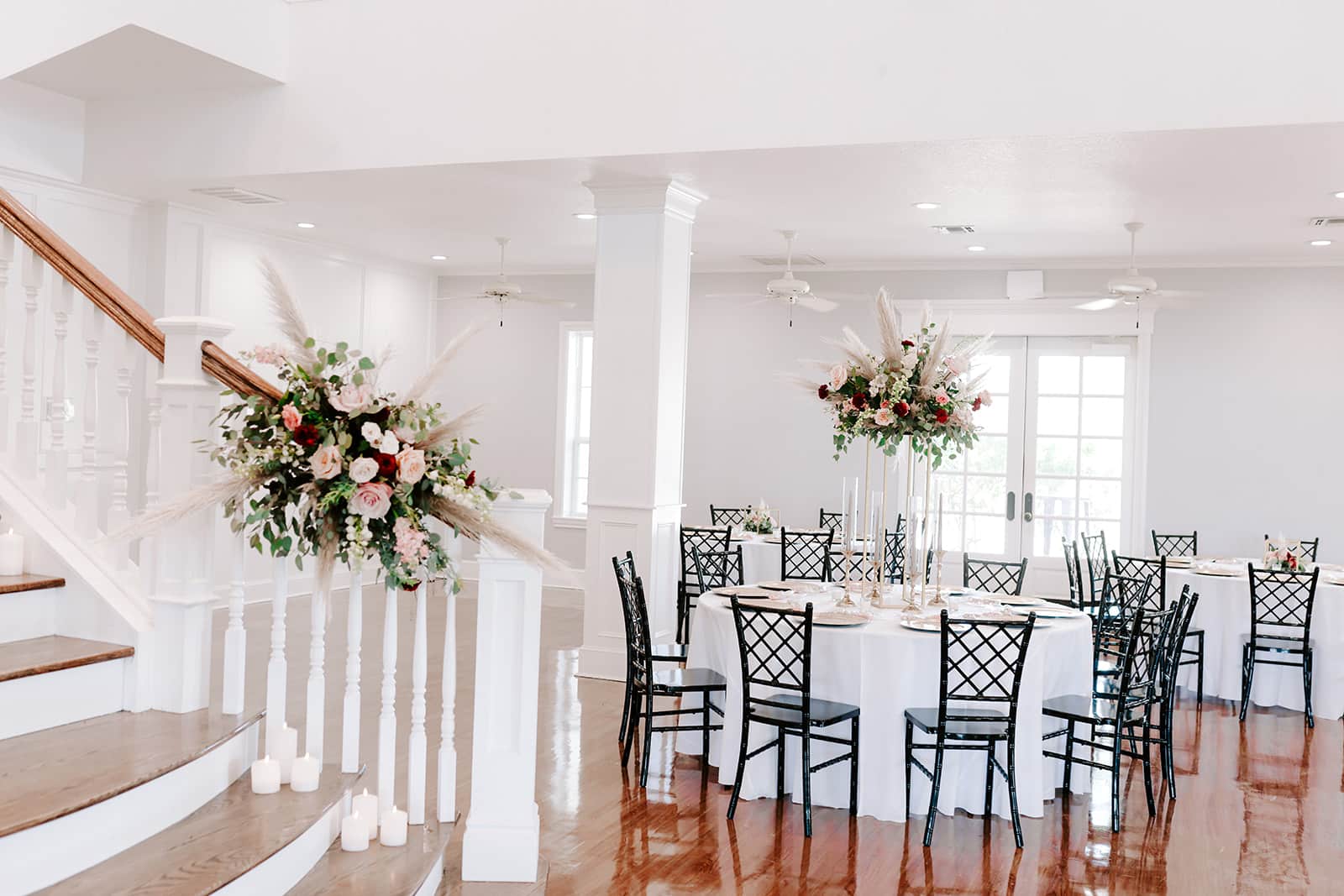 wedding reception setup with minimal floral arrangements