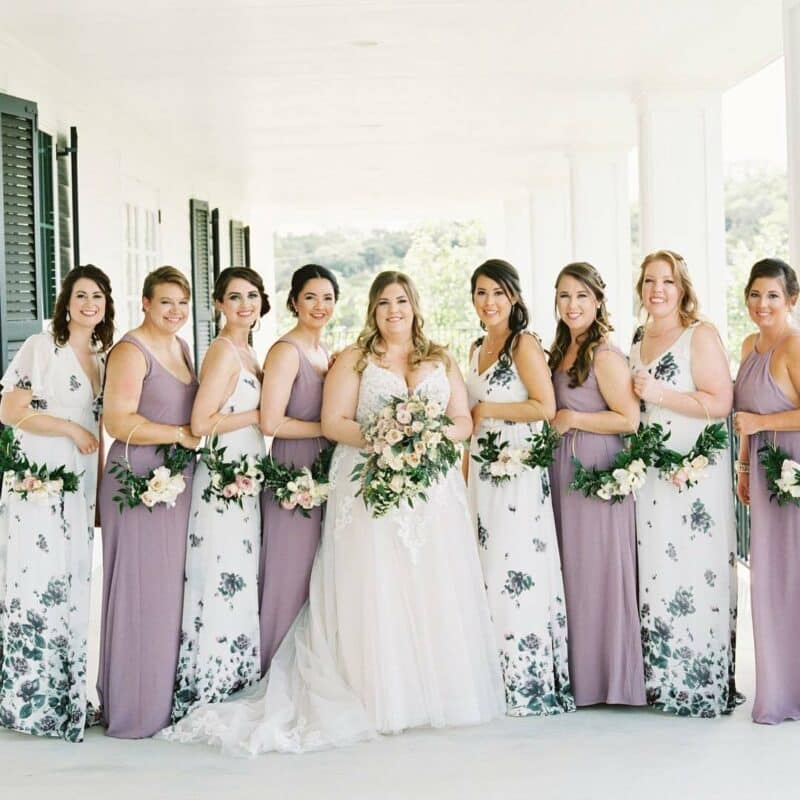 bride and bridesmaids holding hoop bouquets on kendall point terrace