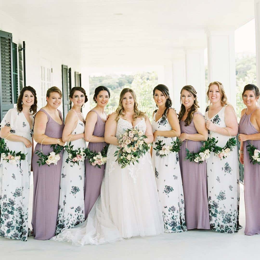 Bride and her bridesmaids in floral and blush dresses at Kendall Point