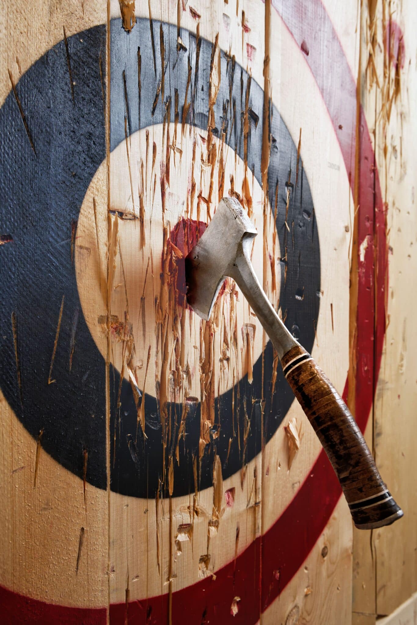 A vertical of a bullseye with a throwing axe