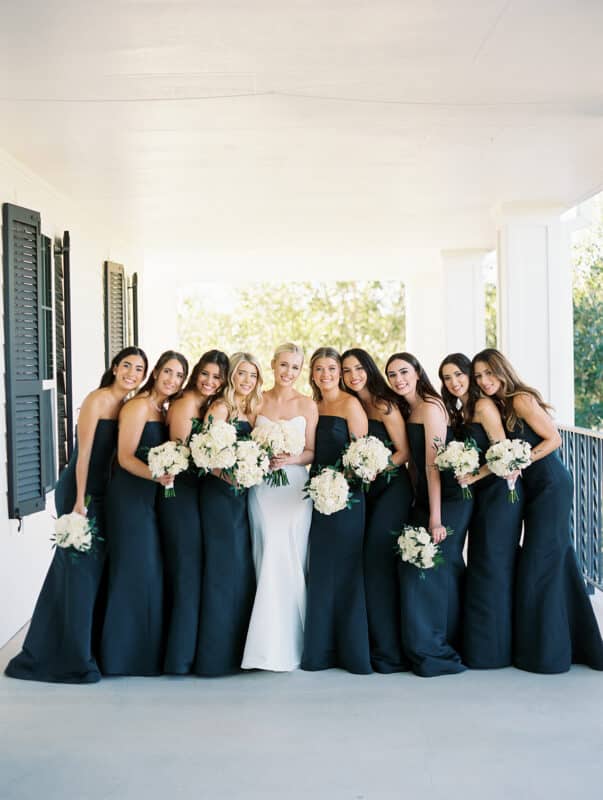 bridesmaids dresses on a porch at kendall point 